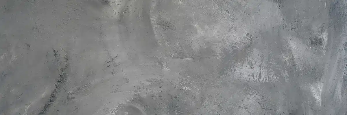 Seamless grey microcement kitchen flooring texture with a polished concrete finish.